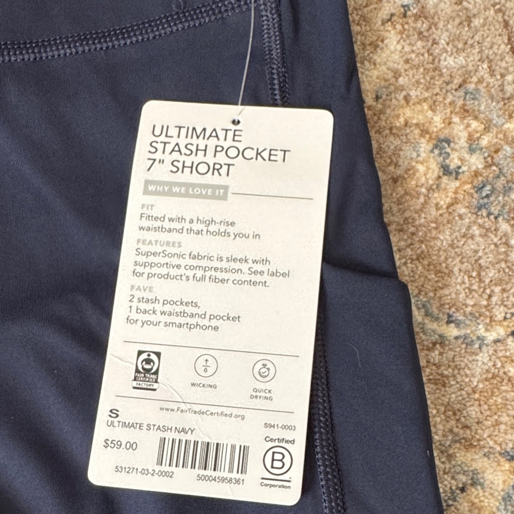 Athleta ultimate stash 7” pocket Navy High-Waisted Shorts - Picture 3 of 9